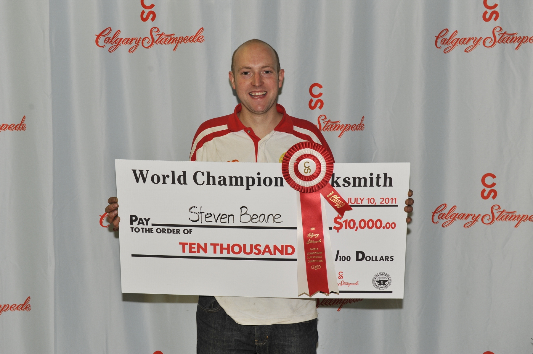 Steven Beane of North Allerton, Yorkshire, England, was all smiles Sunday afternoon after winning his third straight World Championship Blacksmiths’ Competition at the Calgary Stampede. Steven Beane of North Allerton, Yorkshire, England, was all smiles Sunday afternoon after winning his third straight World Championship Blacksmiths’ Competition at the Calgary Stampede.