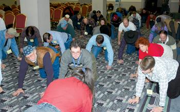 Deb Bennet demonstrates the effects that leaning has on horses