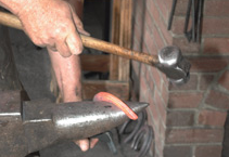 Forging a horseshoe from bar stock Forging a horseshoe from bar stock