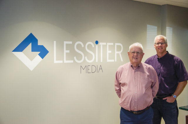 Mike & Frank in front of LM Logo.PNG